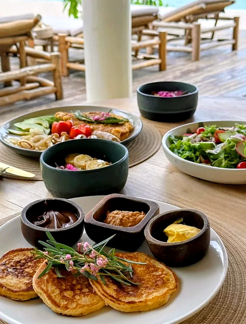 À-la-carte breakfast by the water, included with every stay at Cape Beach Villa, Koh Samui