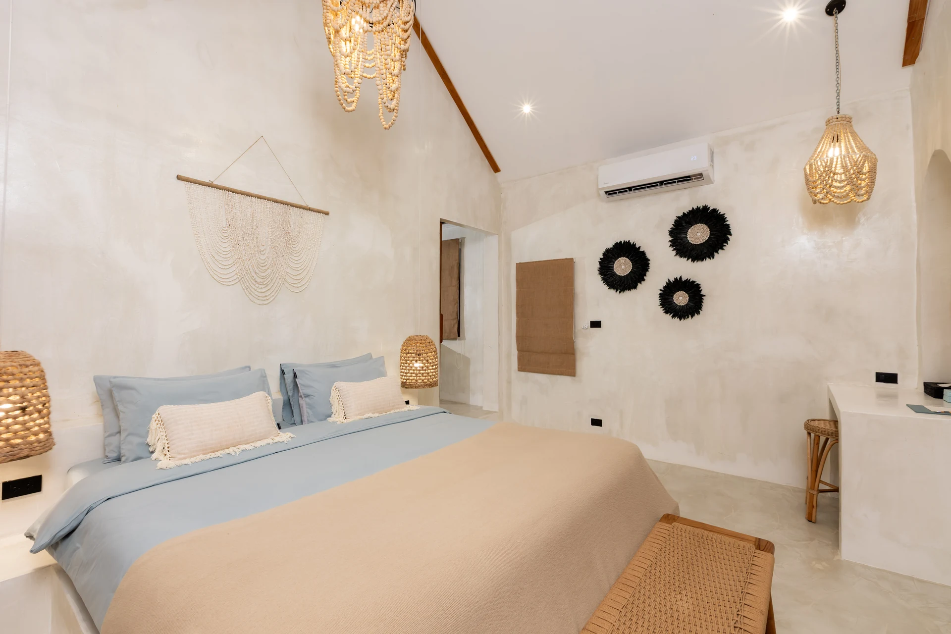Comfort Villa — boho living room with rattan seating (Villa Ginger) — photo 5