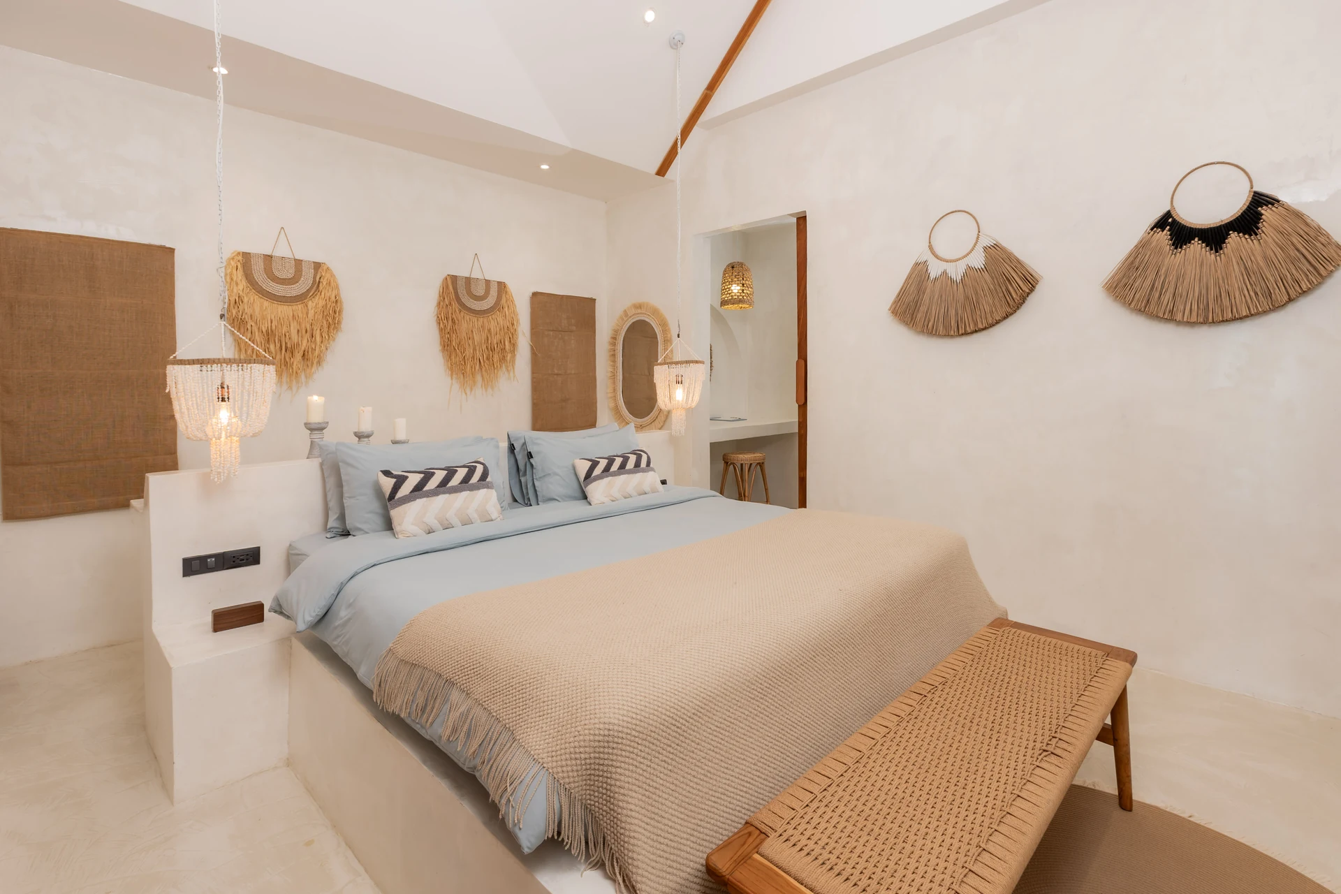 Comfort Villa — boho living room with rattan seating (Villa Ginger) — photo 12